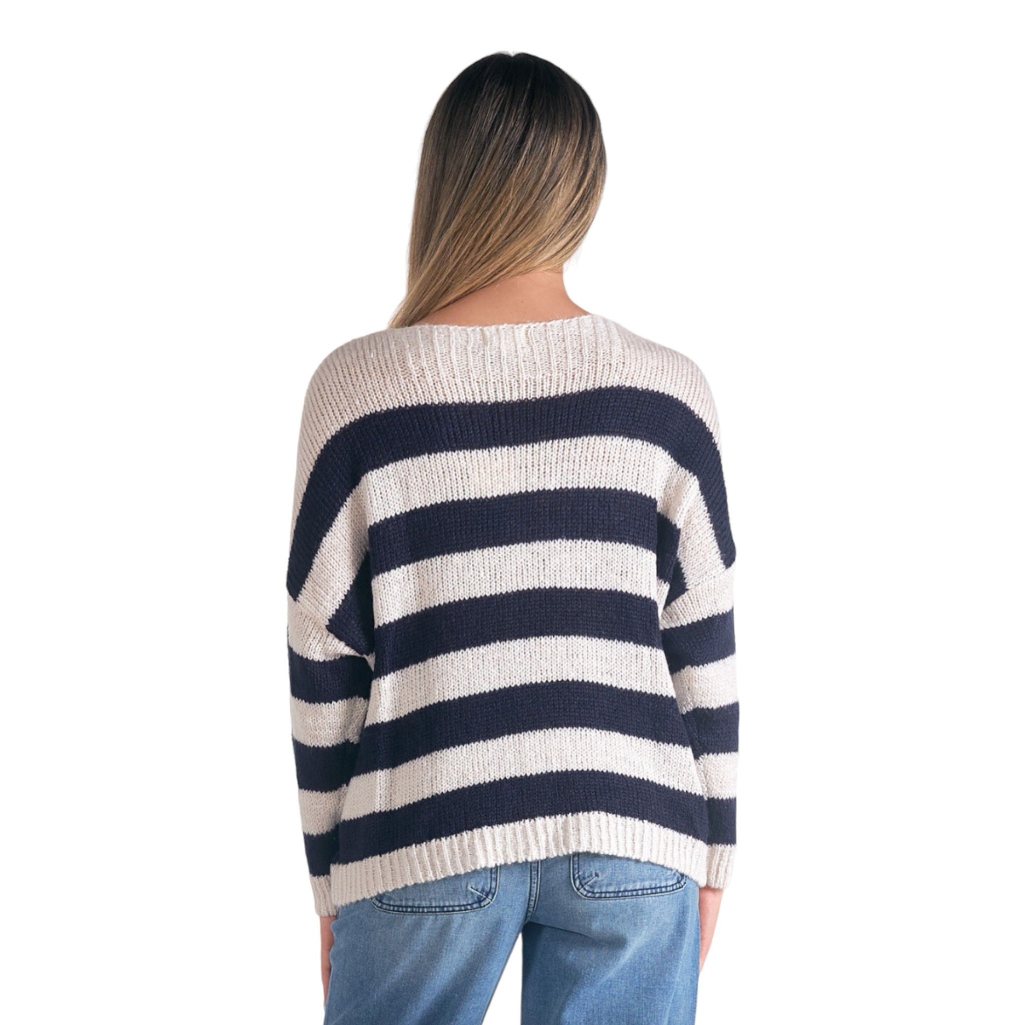 Navy and white striped v neck sweater.