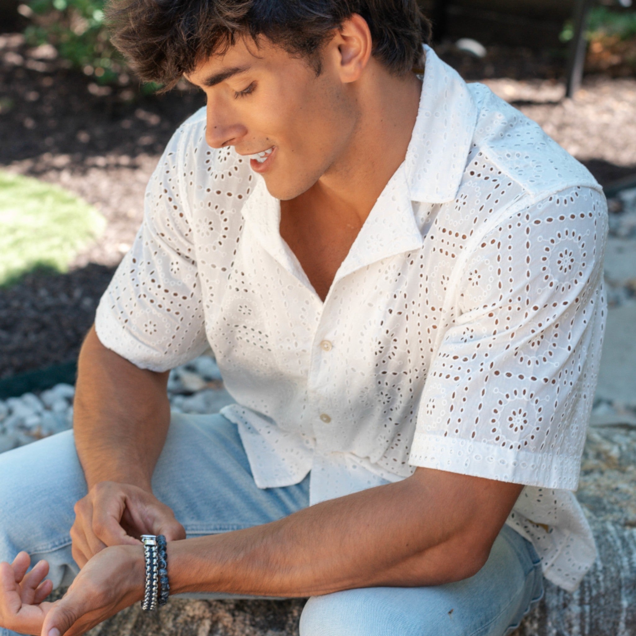 White patterned button up shirt.