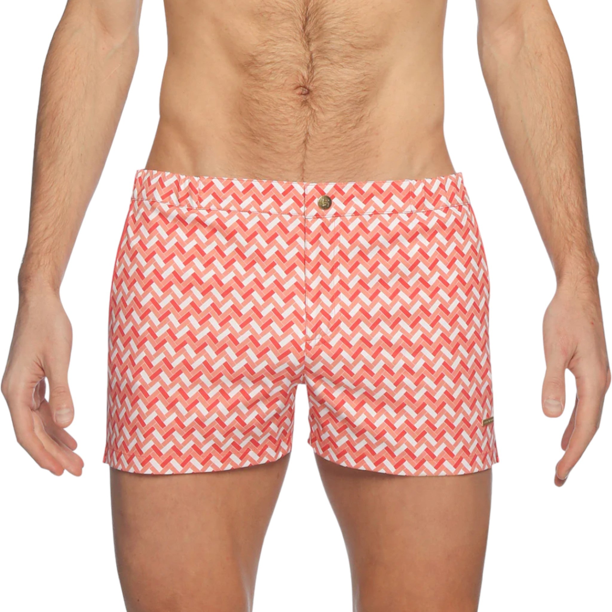 Peach, red, and white patterned swimsuit with button closure